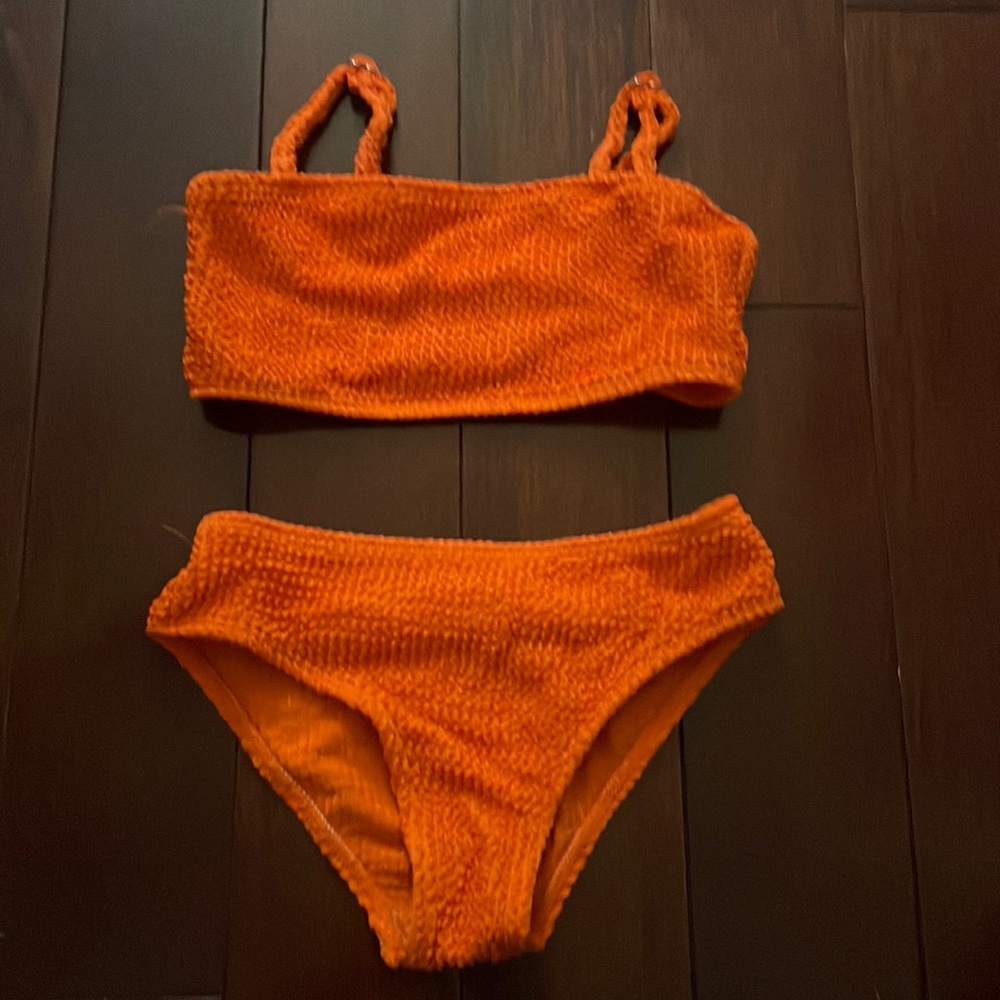Cute orange bikini for a 2 year old.